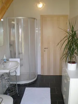 a bathroom with a shower and a sink at FeWo 4 am Martinshof in Eppan im Süden Südtirols in Eppan an der Weinstrasse ST. Pauls