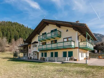 a large house with balconies on the side of it at Apartment Ardoney-1 by Interhome in Campitello