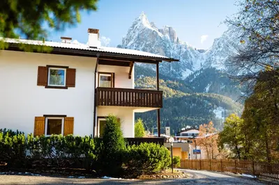 a house with a view of a mountain at Apartment Bellevue Seis in Siusi