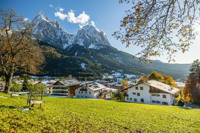 a village with a mountain in the background at Apartment Bellevue Seis in Siusi