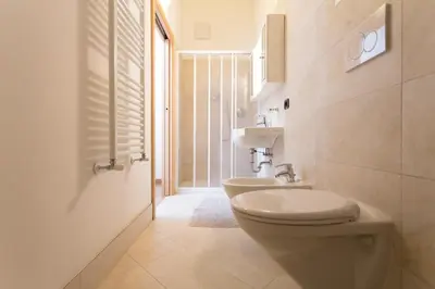 a bathroom with a toilet and a sink at Tobià el Salvan in Pera