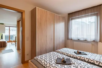 a bedroom with two beds and a window at FaWa Apartments 