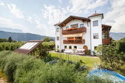 a villa with a view of a house at Bbmarlene in Bolzano