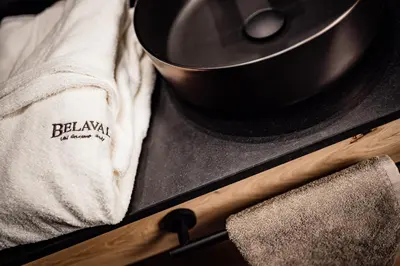 a pot sitting on top of a stove with a bowl at Apartments Belaval in Santa Cristina in Val Gardena