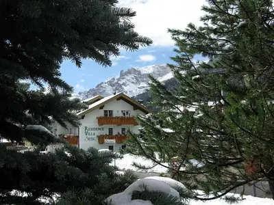 a towel that says resilience will ark in a room at Residence Villa Artic in Campitello di Fassa