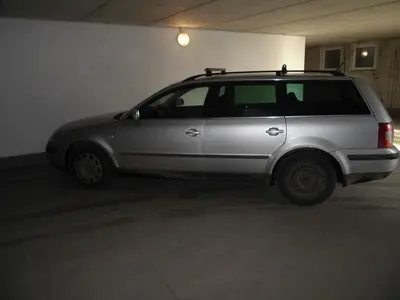 a silver car parked in a parking garage at Villa Bernhard in Siusi