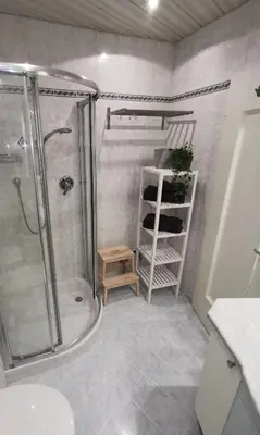 a bathroom with a shower and a sink and a shower at Charmante Wohnung in Zentrum von Nals in Nalles