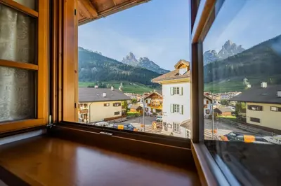 a view from a window of a town at Cesa Meida 4 in Pozza di Fassa