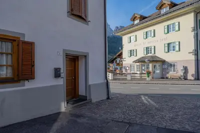 a view of a street in a town with a building at Cesa Meida 4 in Pozza di Fassa