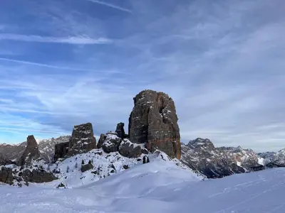 a rock formation in the snow on a mountain at Suite AGB in Mazzin