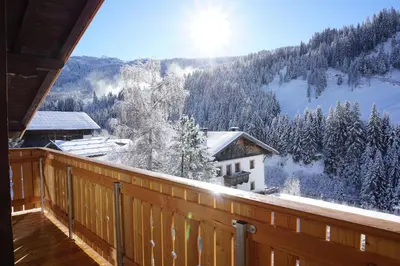 a balcony with a view of a snow covered mountain at Seeberhof in Racines