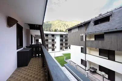 an external view of a building with a balcony at Cesa Alpes 3 in Campitello di Fassa