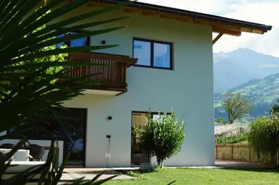 a house with a view of the mountains at Villa Vitis in Rifiano