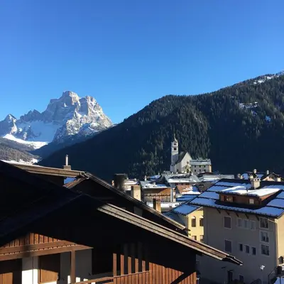 a view of a town with a mountain in the background at Maison Villagrande in Colle Santa Lucia