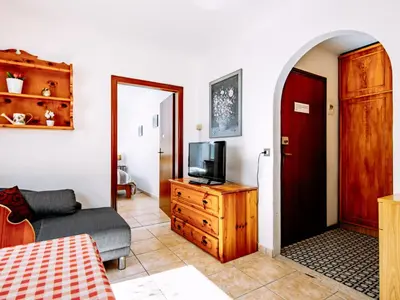 a building with a balcony on the side of it at Apartment Cesa Minach-3 by Interhome in Alba di Canazei