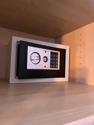 a kitchen with a stainless steel sink and a window at COSTALUNGAHOUSE TrekkingBikeSki selfcheck-in apartment in Carezza al Lago