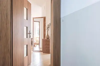 a hallway with a door leading into a room at Appartment Lissi in Merano