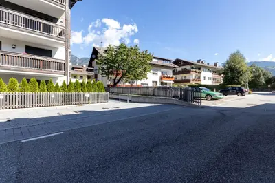 an empty street in front of a building at Casa Fiammetta in Brunico