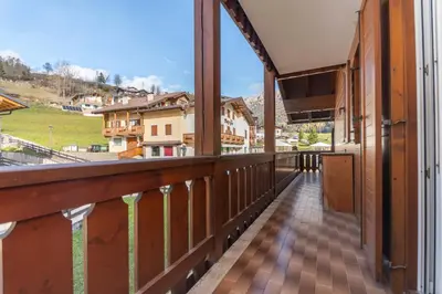 a balcony with a view of the mountains at Casa Blue Sky in Moena