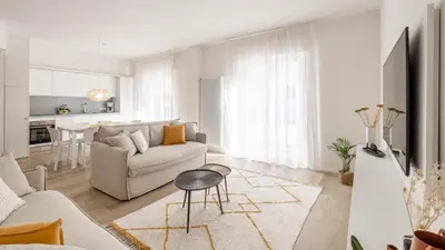 a living room with a couch and a table at Italyescapes Maia in Merano