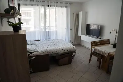 a hospital room with a bed and a tv at Casa Ricky in Bolzano