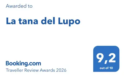 a screenshot of a cell phone with the text la tiana del lupo at La tana del Lupo in Falcade