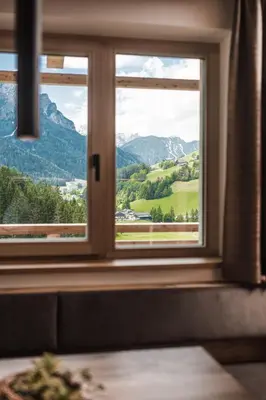 a window with a view of a mountain view at Biohof Untergröber in Braies