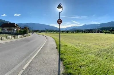 a street light on the side of a road at Sylvester Apartment in Riscone