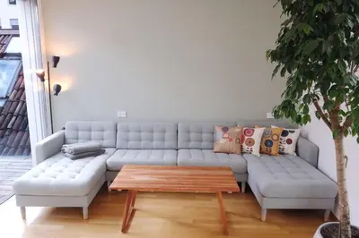 a living room with a couch and a coffee table at Apartment Lauben - Alpstay in Merano