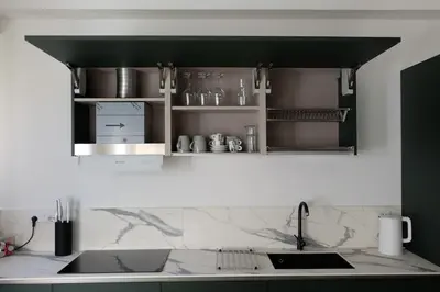 a kitchen with a sink and a counter top at Green View: il verde in città in Bolzano