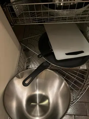 a metal bowl in a shelf with a laptop on it at Loft a Canazei vicino alle piste vista Marmolada in Alba di Canazei