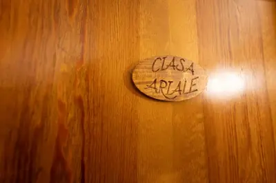 a wooden door with a sign that says glass acidale at Cesa Ariale in Canazei