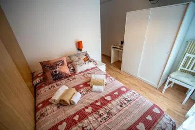 a room with a window with a view of a mountain at Cèsa Cherpei - Dog Friendly in Campitello di Fassa