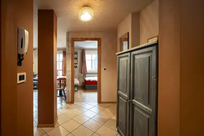 a hallway of a house with a door and a room at Ciasa Buro - Coba in Moena