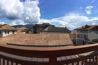 a view of a roof of a town with buildings at da Stoimenov in Fondo