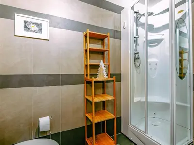 a bathroom with a shower and a toilet at Apartment Appartamento 29 by Interhome in Alba di Canazei