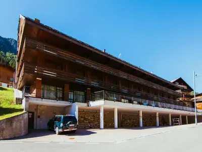 an old car parked in front of a building at Apartment Appartamento 29 by Interhome in Alba di Canazei