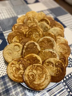 a plate of pastries sitting on a table at Garní Ladinia in Pescul