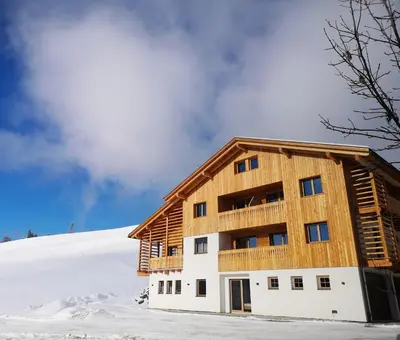 a view of a snow covered mountain from a house at Chalet Soredlin in La Valle