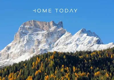 a mountain with autumn trees in the foreground and the words home today at Hometoday - Appartamento nel cuore di San Vito di Cadore in San Vito di Cadore