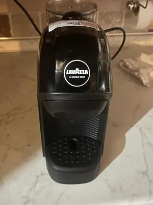 a black blender sitting on top of a counter at Casa De Lotto in San Vito di Cadore