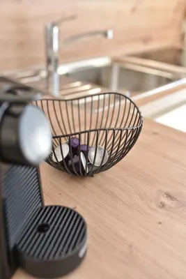 a wire basket sitting on top of a counter at Apartments Johanna in Nalles