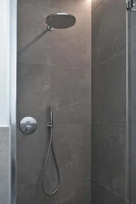 a bathroom with a shower with a glass door at Apartments Johanna in Nalles