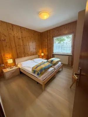 a bedroom with a bed and a window at Appartamento Scacciapensieri in Meida