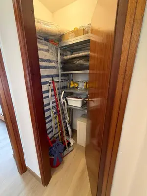 a closet with a bunch of tools in it at Appartamento Scacciapensieri in Meida
