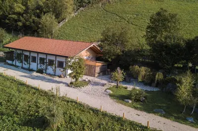 a small house in the middle of a field at Mittersteinerhof in Villabassa