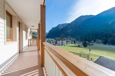 a balcony with a view of the mountains at Cesa Antermoia in Mazzin