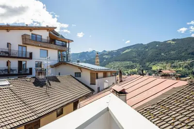 a view from the roof of a building with mountains in the background at CASA PARE' B&B in Tesero