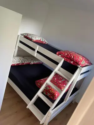 a pair of bunk beds in a room at Apartment LUNA in Tesero