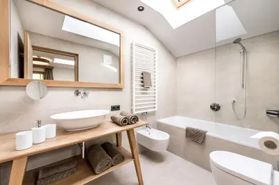 a bathroom with a shower and a toilet and a sink at Hoferhof in Maranza